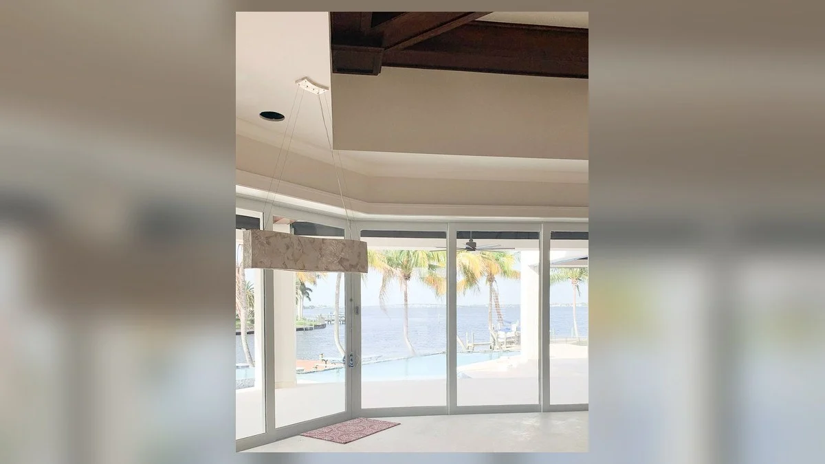 Motorized solar shades controlling bright Southwest Florida daylight
