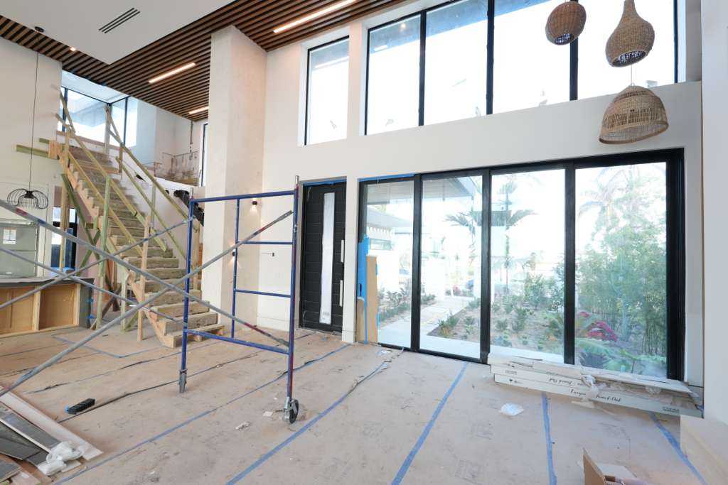 Before Photo Of Floor To Ceiling Windows Prepared For Automated Shade Integration