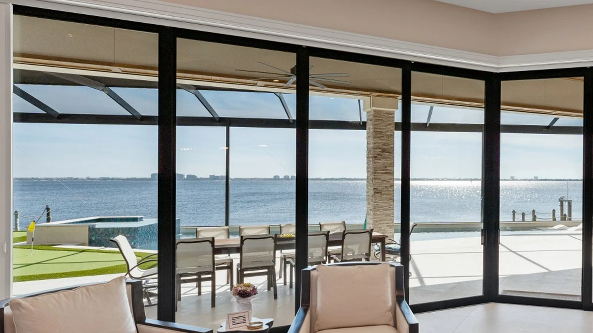Cord-free honeycomb shade fitted closely inside a bright window