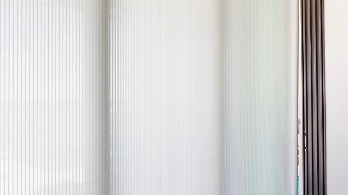 Custom room-darkening shade selected for a Cape Coral interior
