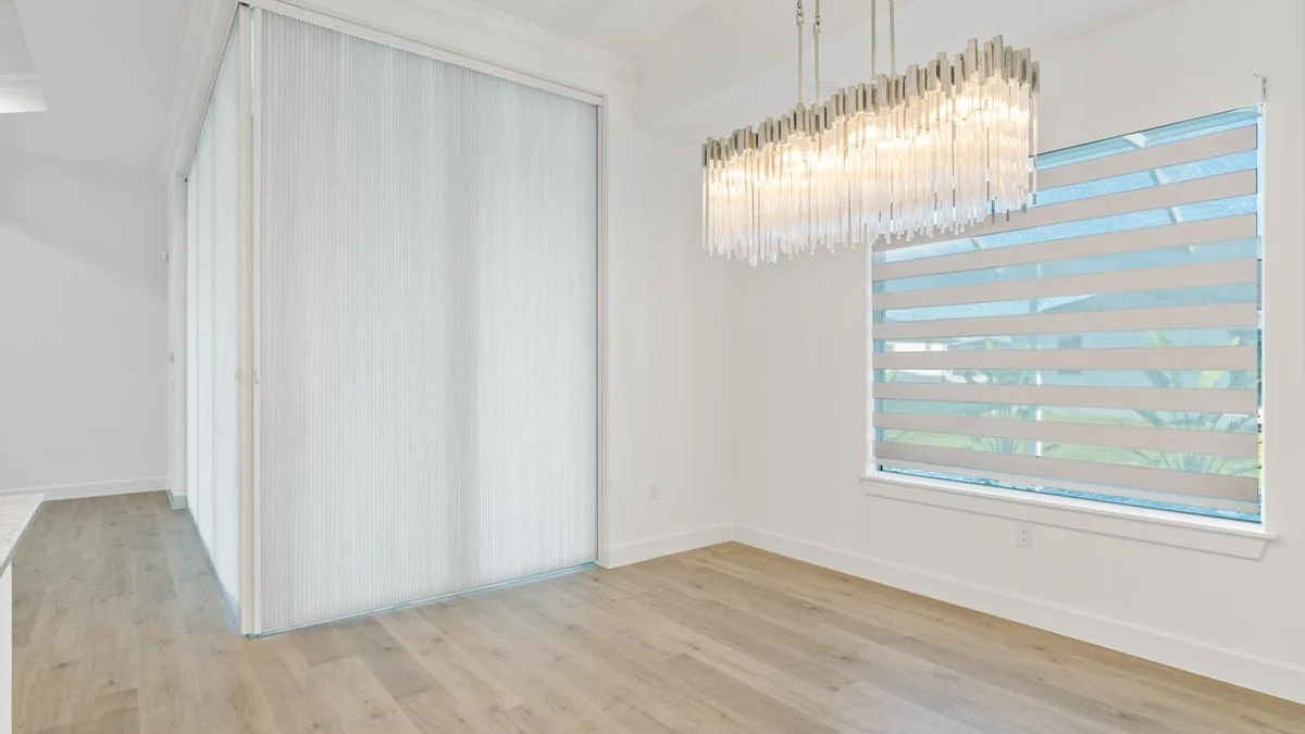 Layered shades installed in a modern Cape Coral interior