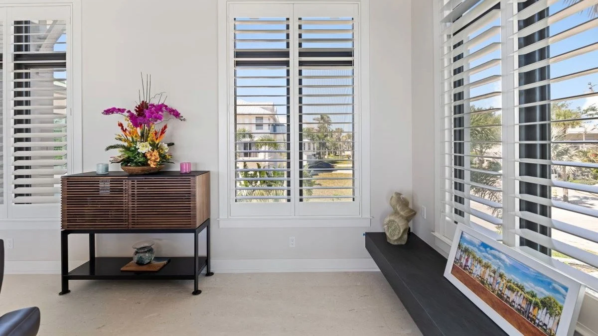 White interior shutters adding durable architectural detail