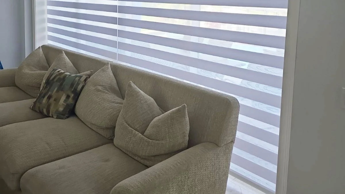 Zebra window treatment adjusted for daytime light control