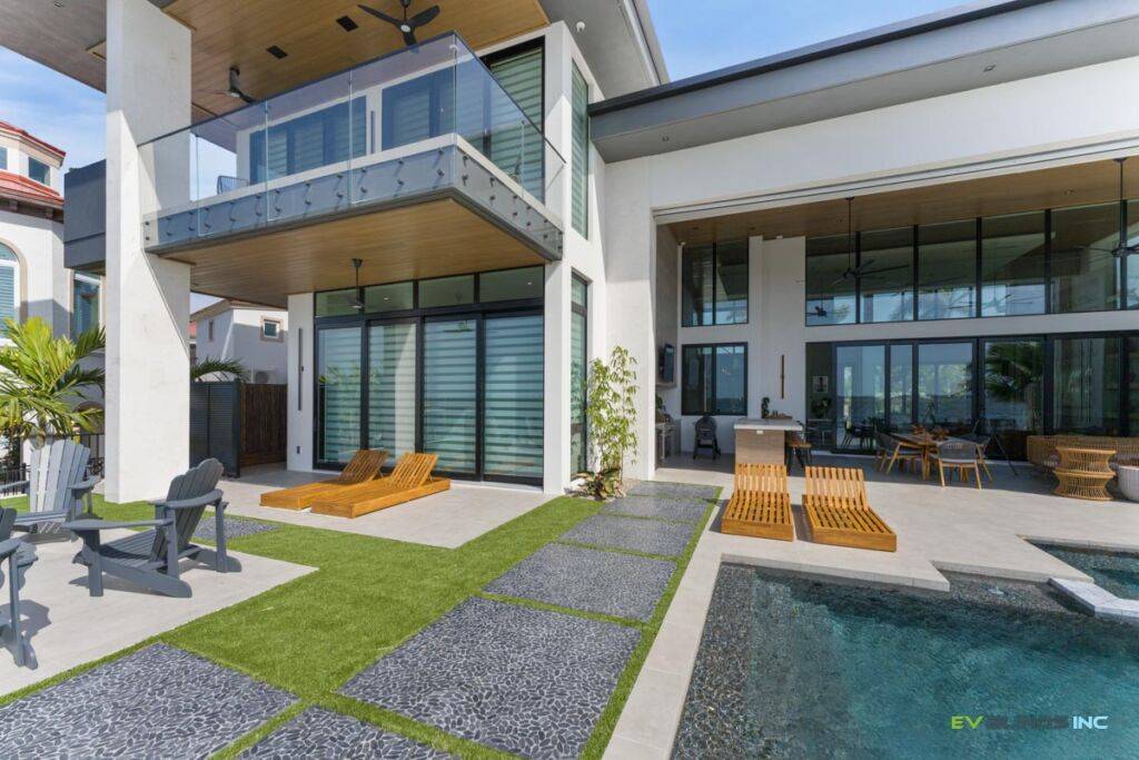 Motorized roller shades on large window treatments by EV Blinds