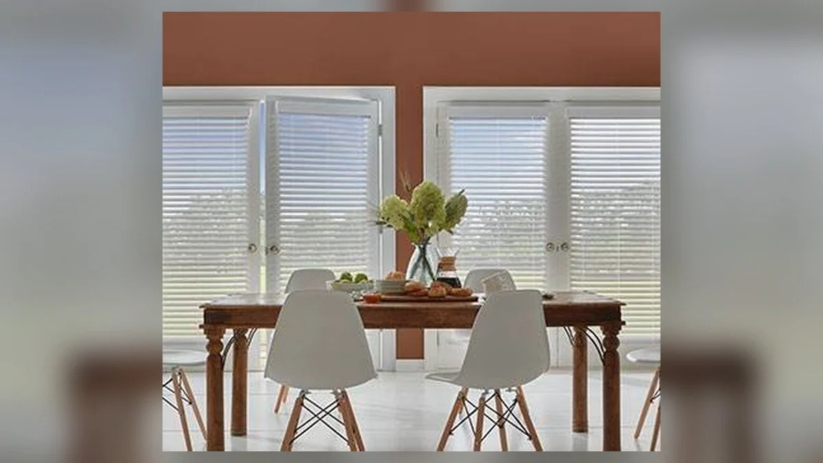 Made-to-measure slat blinds aligned across a window opening