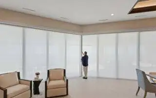 Light Filtering Cellular Sliders Dining Full Close With Man EV Blinds Light Filtering Cellular Sliders Dining Full Close With Man by EV Blinds custom window treatments