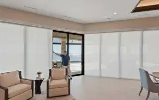 Light Filtering Cellular Sliders Dining Half Open With Man EV Blinds Light Filtering Cellular Sliders Dining Half Open With Man by EV Blinds custom window treatments