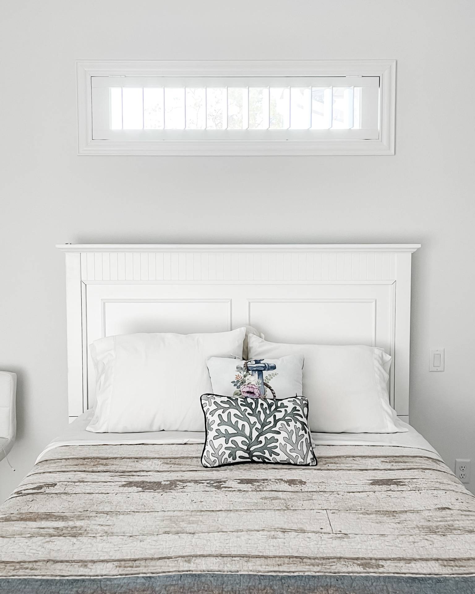 Custom minimalist design mini blinds installed in SWFL bedroom