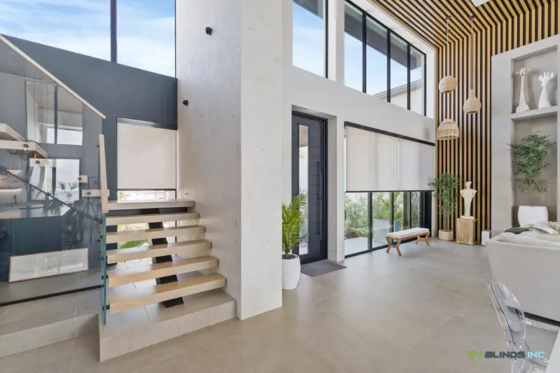 Motorized roller shades on large window treatments by EV Blinds