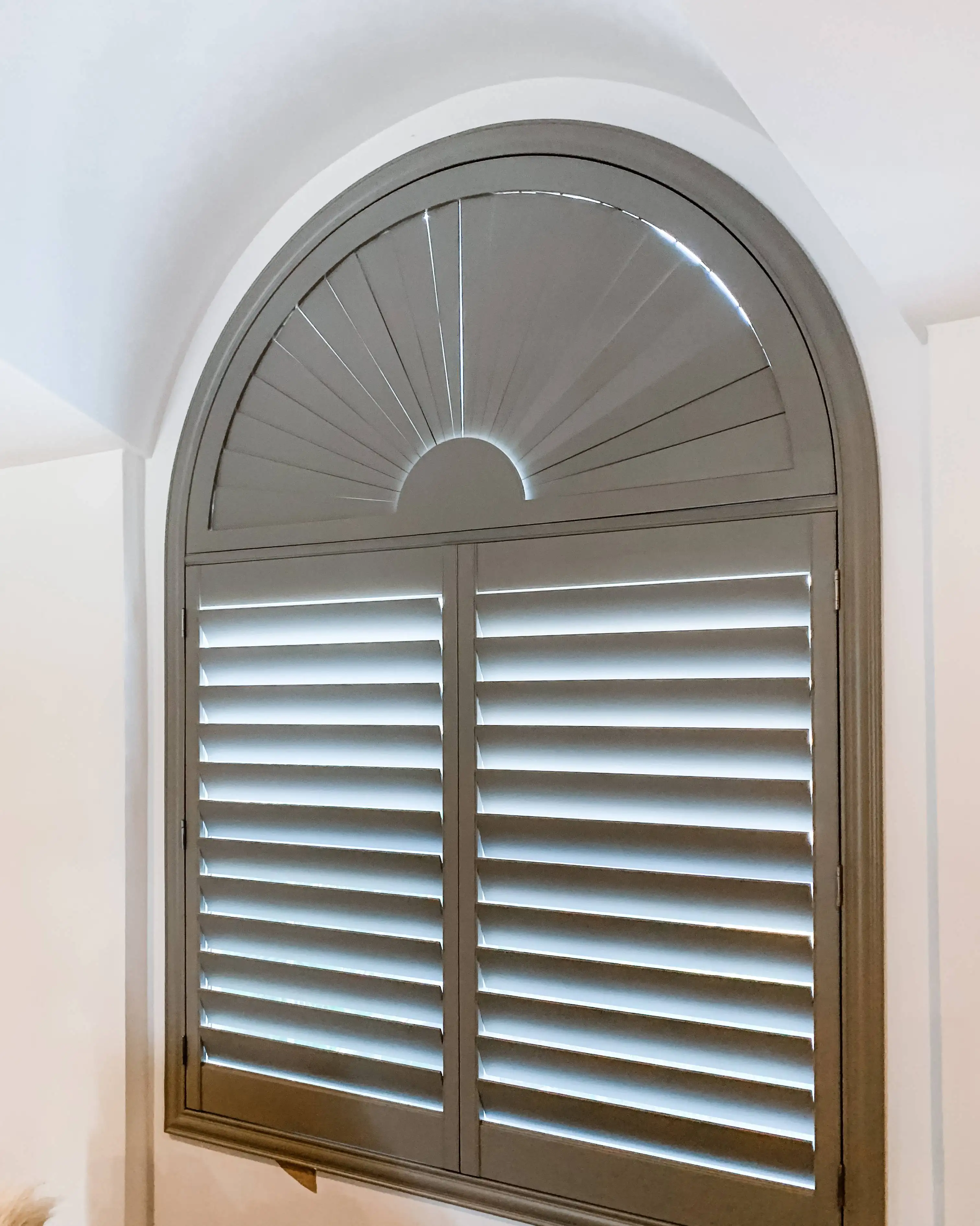 Plantation Shutters | arched windows | hallways | Estero Plantation Shutters for arched windows in hallways in Estero