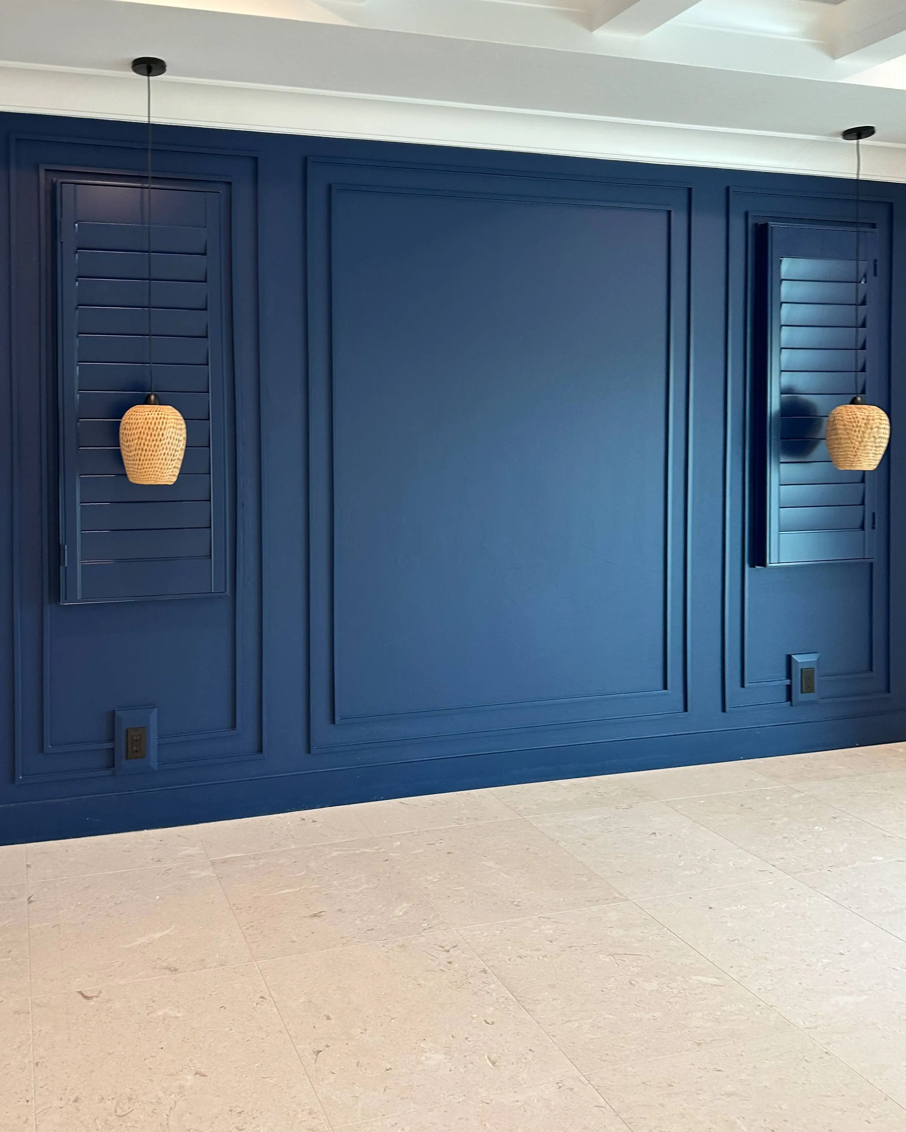 Plantation Shutters for bay window in living room in Pelican Bay