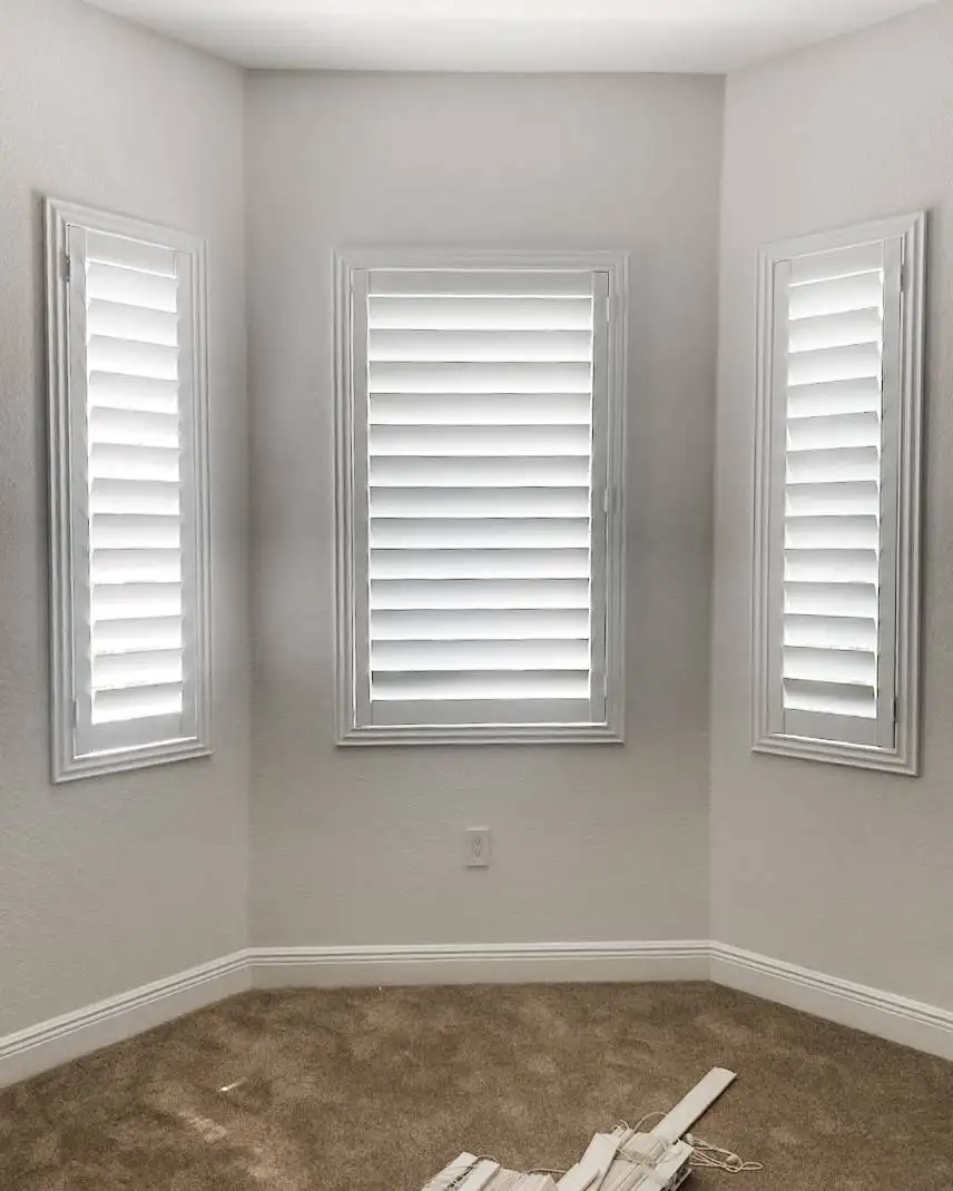Plantation Shutters | bay windows | living room | Estero Plantation Shutters for bay windows in living room in Estero