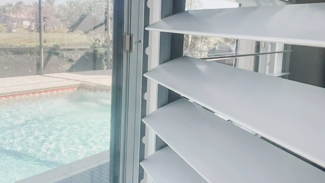 Plantation Shutters for small window blind in hallways in Bonita Bay