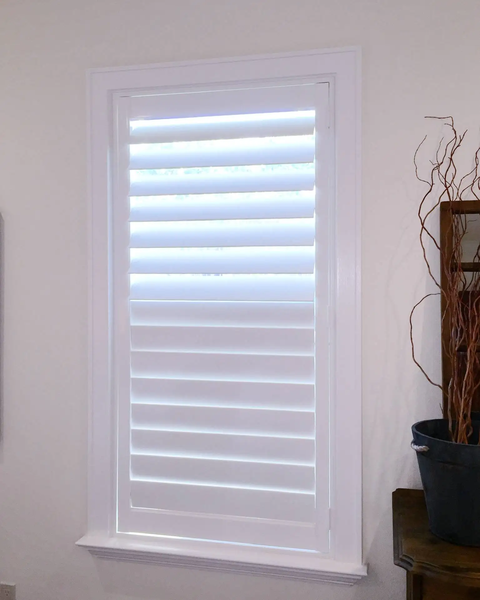 Plantation Shutters for small window blind in living room in Naples