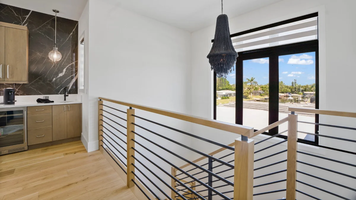Zebra blinds installed on a high stair window