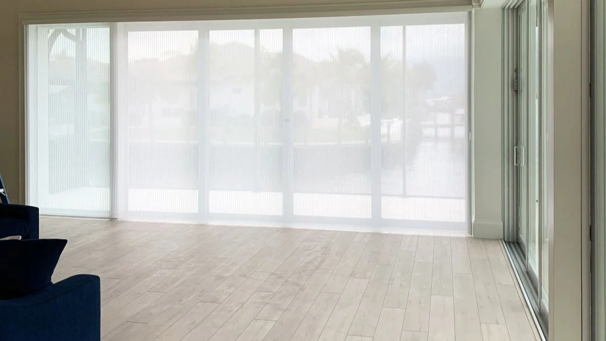 Cellular slider shades installed in a Punta Gorda living room