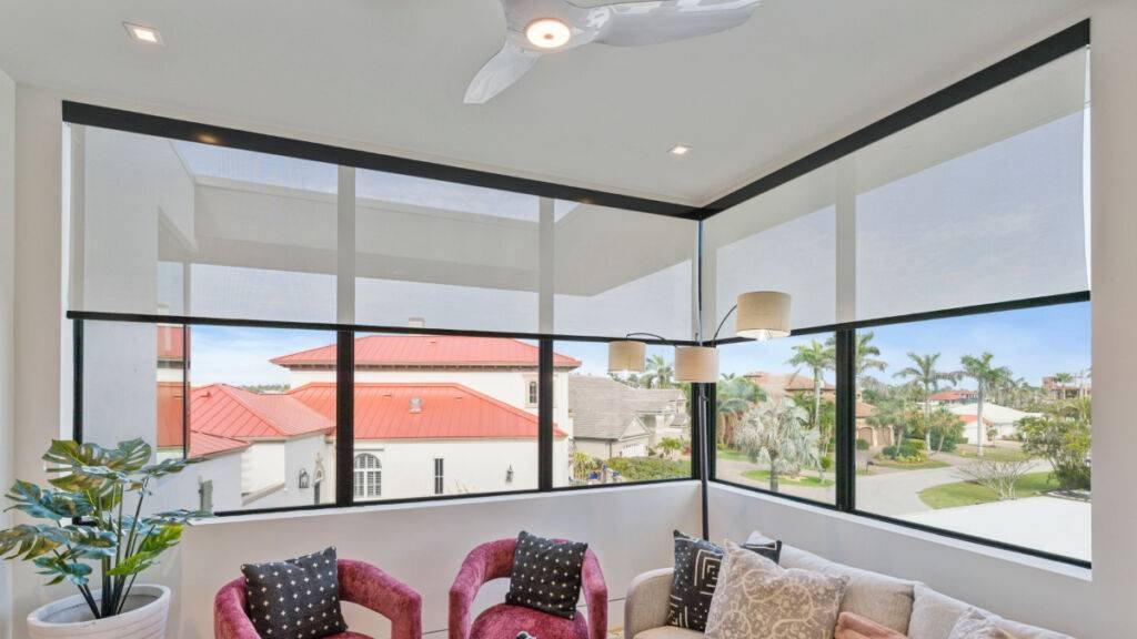 Roller Shades Living Room Half Open by EV Blinds custom window treatments
