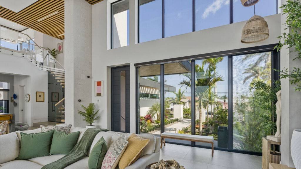 Roller Shades Living Room Wide Angle Full Open Other Angle by EV Blinds custom window treatments