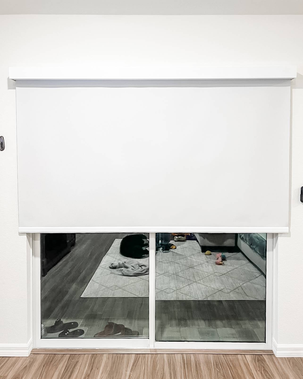Roller Shades for sliding doors in living room in Cape Coral