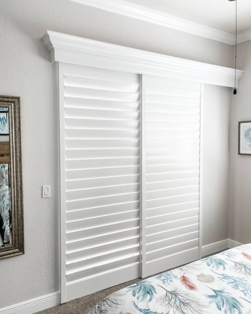 Sliding Shutters for large windows in bedroom in Cape Coral
