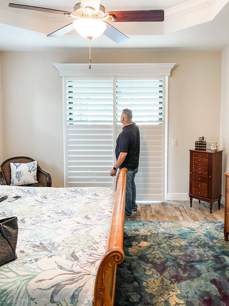 Sliding Shutters for large windows in bedroom in Estero