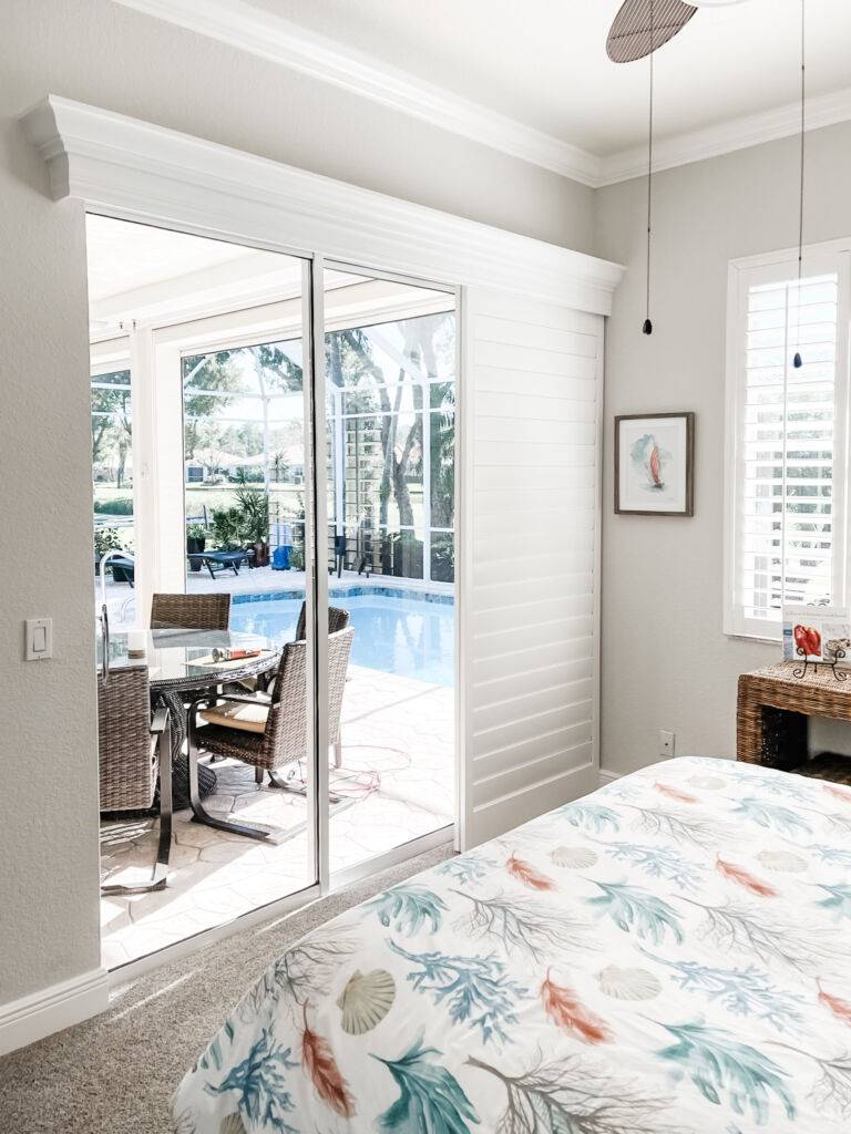Sliding Shutters for large windows in bedroom in Estero