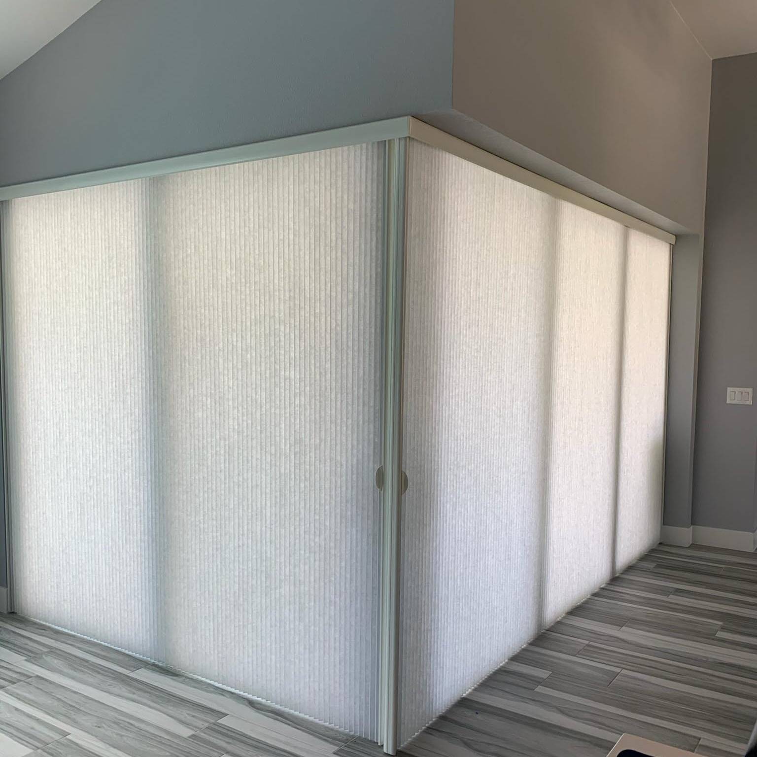 Vertical cellular shades- Custom Window Treatments by EV Blinds