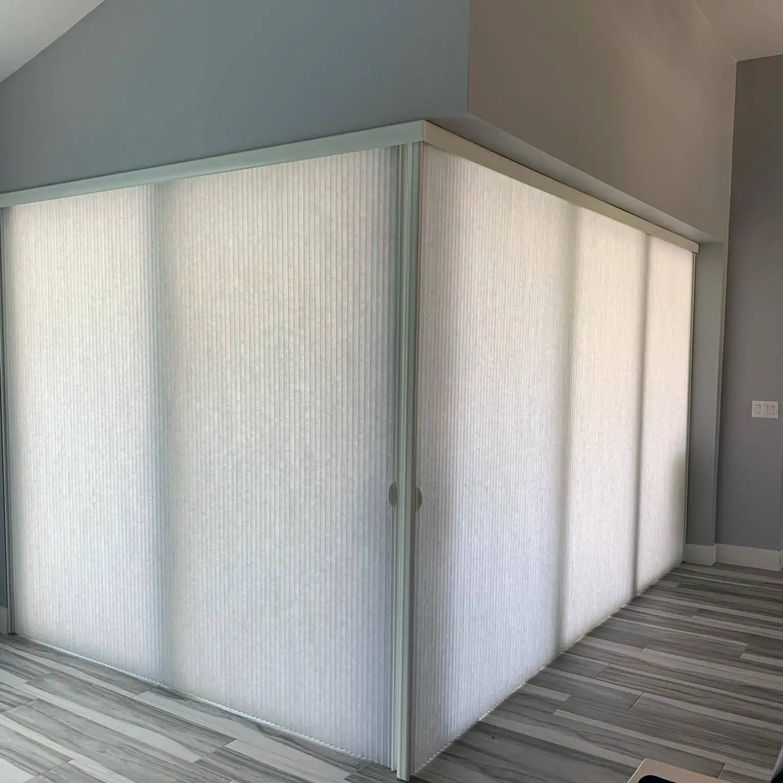 Vertical cellular shades- Custom Window Treatments by EV Blinds