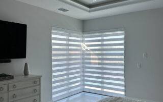 Zebra Shades for corner window in bedroom in Naples High Rise