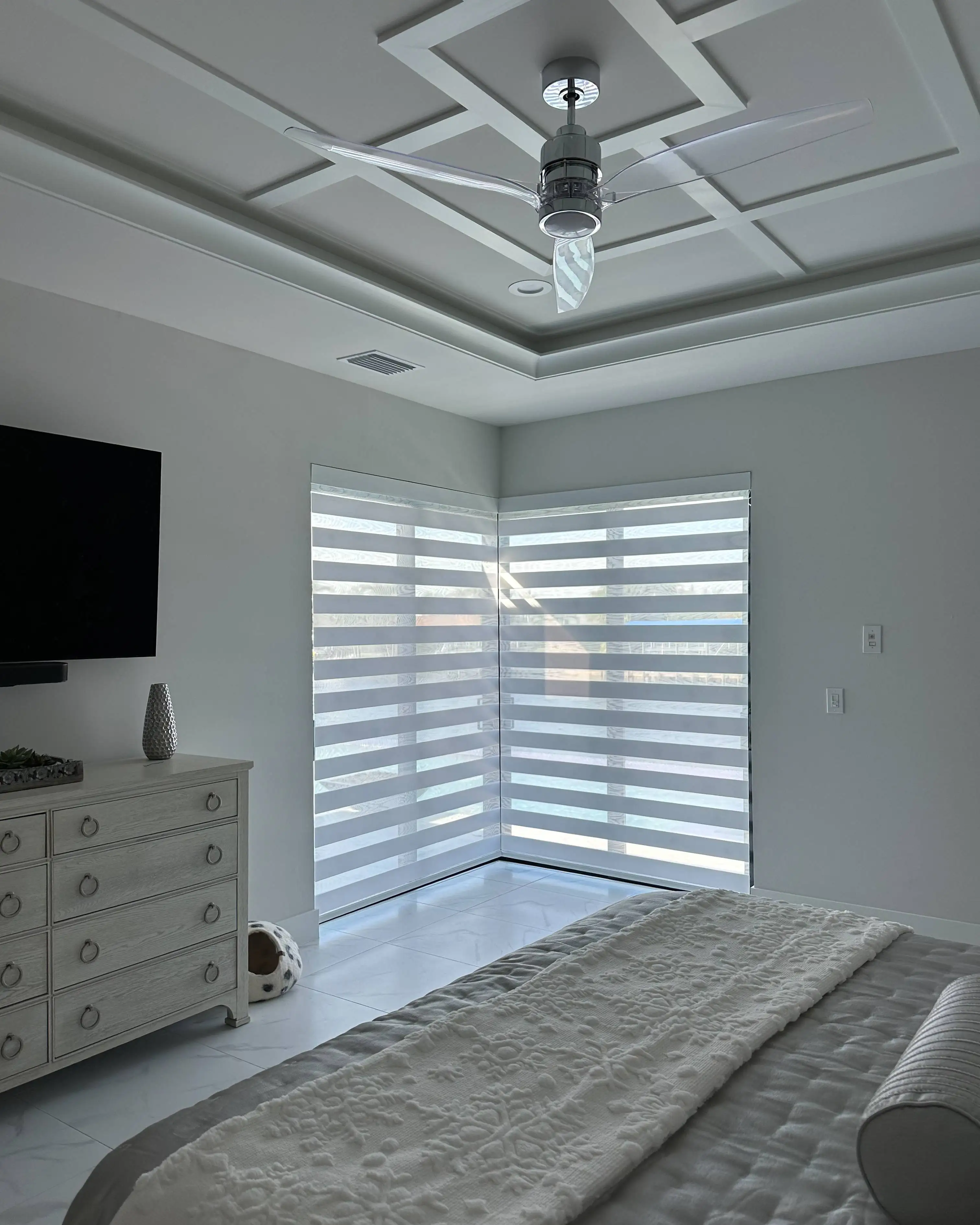 Zebra Shades for corner window in bedroom in Naples High Rise