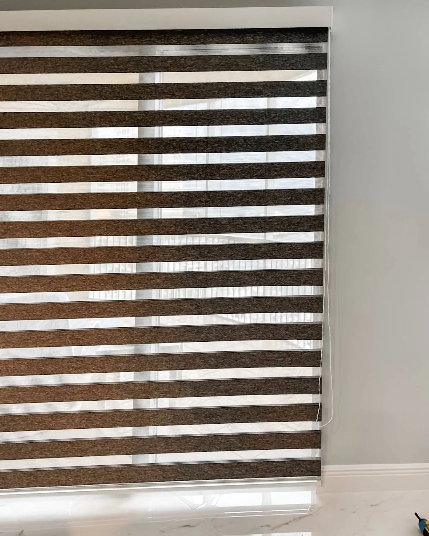 Zebra Shades | sliding doors | dining room | Estero Zebra Shades for sliding doors in dining room in Estero